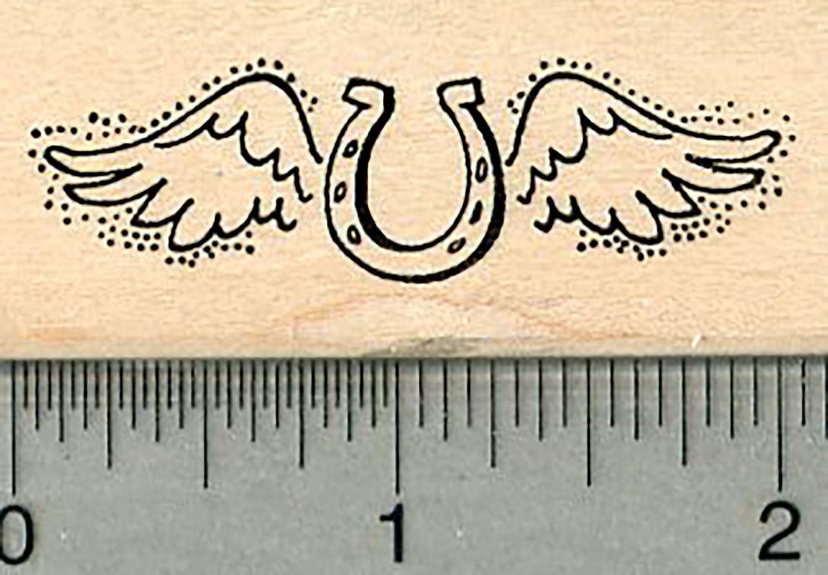 horseshoe tattoo with wings